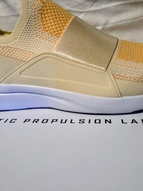 APL Techloom Bliss Knit Sneaker in Vanilla, Mango, And White